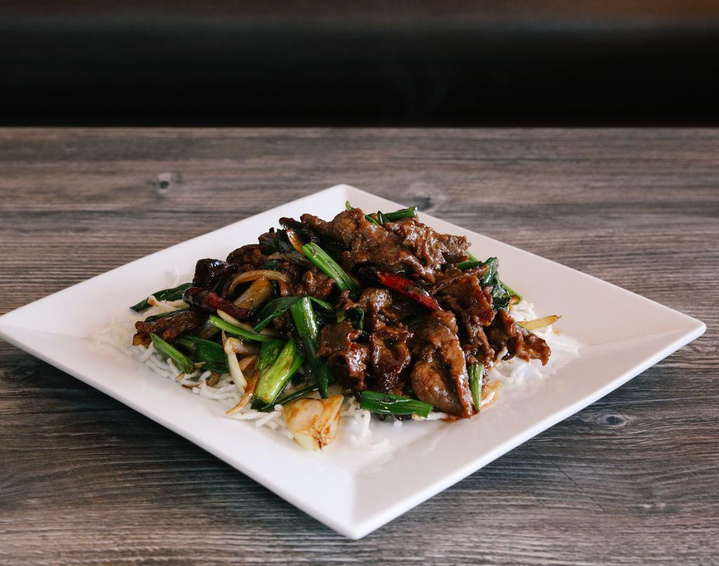 Mongolian Beef · Spicy. Stir-fried beef with green onion, white onion, crispy noodle and spicy chili.