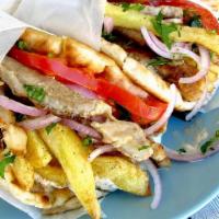 Gyro · Warm pita bread filled with a mix of lettuce, tomato, onion, carrot, purple cabbage, tzatzik...