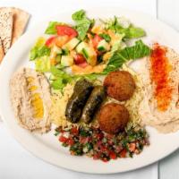 Vegetarian Lovers Plate · Combination of hummus, Baba ghanouj, grape leaves, falafel, salad and tabouleh.