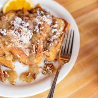 Pear French Toast · Veggie. Brioche French toast topped with spiced pear sauce, pecans and cinnamon butter.