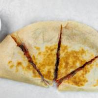 Build Your Own Quesadilla W/Meat · Choice of bread, cheese, meats, veggies and sauces.