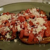 Roma Bruschetta · Vine-ripened Roma tomatoes, garlic, mozzarella, and fresh basil, served on panini bread and ...