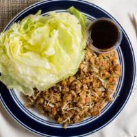 Asian Lettuce Wraps · Diced white meat chicken, water chestnuts, celery, carrot, scallion, rice sticks, and cool l...