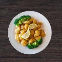 Zesty Lemon Chicken · Wok-seared in lemon tangy sauce, garnished with broccoli