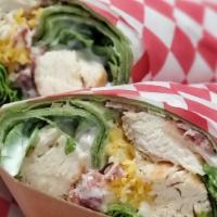 Chicken Wrap · Our fresh spinach wrap served with choice of fried or grilled chicken, lettuce, cheese, baco...