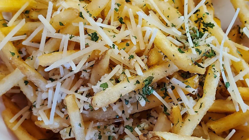 Small Garlic · A portion of our fresh shoestring fries topped with fresh garlic, parmesan, and parsley!