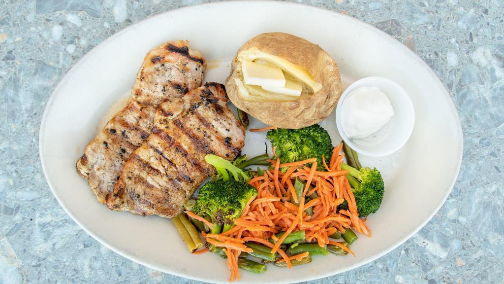 Grilled Pork Chop (8 Oz) · Fresh cut pork loin, seasoned and grilled to perfection.

Consuming raw or under cooked meats, poultry, seafood or eggs may increase risk of foodborne illness.