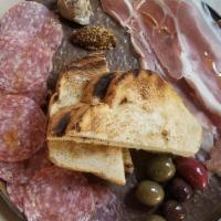 Charcuterie · selection of salami and cured meats.