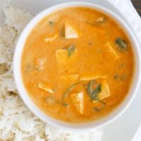 Red Curry · With bamboo shoots, bell peppers and basil sauteed in coconut milk and red curry paste.