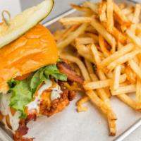 Big Country · Flash fried chicken breast, applewood smoked bacon, melted cheddar, ranch, green leaf, tomat...