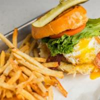 Brunch Burger · 1/2 lb. ground chuck, applewood smoked bacon, cheddar, fresh fried potato hash, fried egg, g...