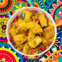 Cauliflower Potato Masala · Fresh cauliflower and potatoes cooked with herbs and spices, served with a side of aromatic ...