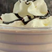 Chocolate Milkshake · 16oz chocolate milkshake topped with whipped cream