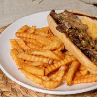Philly Cheesesteak · Thinly sliced steak grilled with onions and bell peppers topped with Provolone cheese inside...