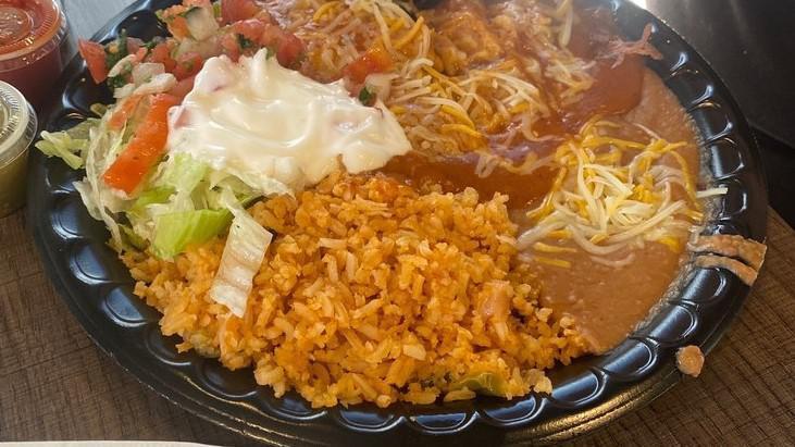 Cheese Enchilada · Smothered in enchilada sauce. Topped with lettuce, tomatoes, cheese, and sour cream. Two per order.