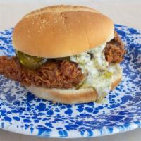 Fried Chicken Sandwich · Fried chicken thigh, ranch, and jalapeño jelly with bread and butter pickles.