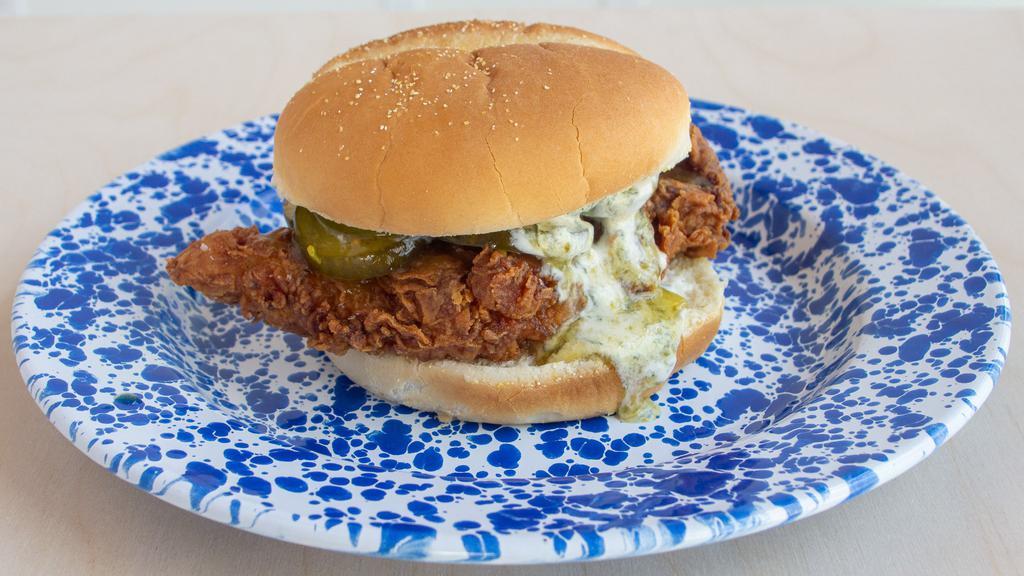 Fried Chicken Sandwich · Fried chicken thigh, ranch, and jalapeño jelly with bread and butter pickles.