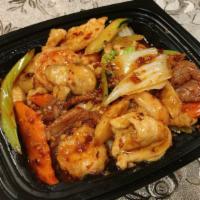 Garlic Triple Combo · Spicy. Chicken, beef, and shrimp.