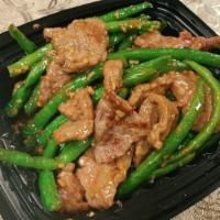 Beef With String Beans Dinner · Served with rice.