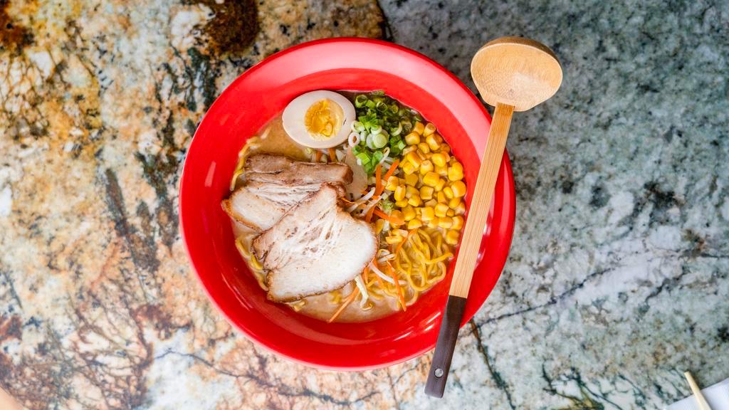 Miso Ramen · Pork belly or chicken breast, egg, cabbage, carrot, yellow onion, bean sprouts, corn, and green onion in miso broth.