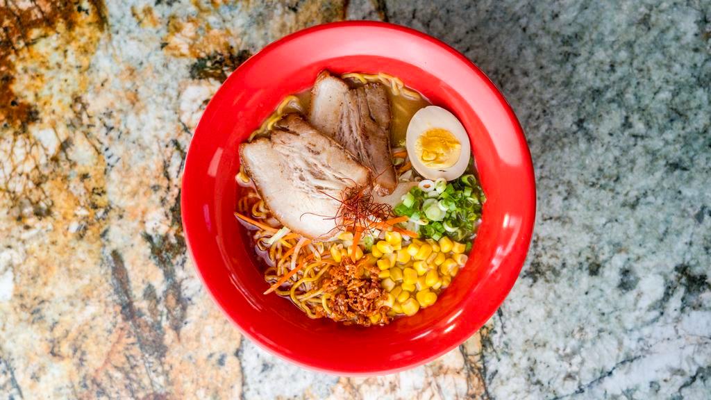 Red Spicy Miso Ramen · Spicy. Pork belly or chicken breast, egg, cabbage, carrot, yellow onion, bean sprouts, corn, green onions, and shredded chili pepper in miso broth and spicy chili oil.