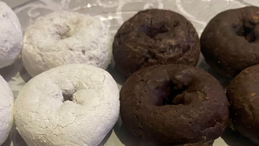 Dark Chocolate Mini Donuts (Dozen) · Enjoy 12 mini donuts dipped in dark chocolate