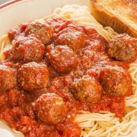Spaghetti & Meatball · Served with garlic bread and a salad.