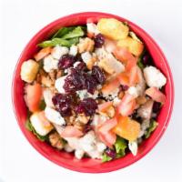 Cranberry Chicken Salad · Grilled chicken breast, Bleu cheese crumbles, walnuts, cherry tomato, cucumber, dried cherri...
