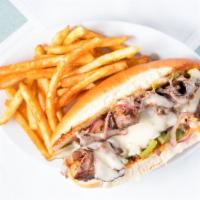 Philly Cheese Steak Sandwich · Grilled sirloin steak topped with Provolone cheese, mayo, sautéed onion, di-green and red be...