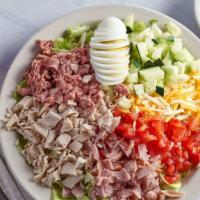 Chef Salad · House specialty. With lettuce, tomatoes, cucumber, roast beef, turkey, ham, Swiss cheese and...