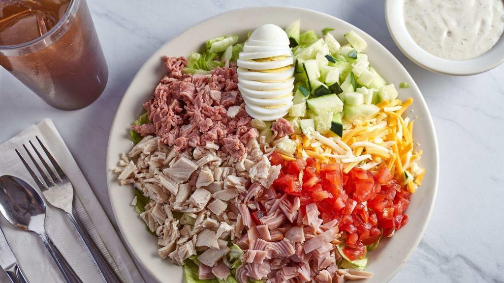 Chef Salad · House specialty. With lettuce, tomatoes, cucumber, roast beef, turkey, ham, Swiss cheese and hard-boiled egg.
