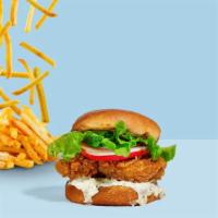 Classic Fried Chicken Sandwich · Crispy fried chicken,  pickles, and Cluck sauce served on a toasted bun.