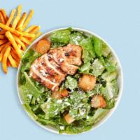 Chicken Caesar Salad · Romaine lettuce, grilled chicken, house croutons, and parmesan cheese tossed with caesar dre...
