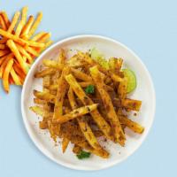 Flaming Fries · Idaho potato fries cooked until golden brown and garnished with spicy seasoning.