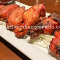 Tandoori Wings · Chicken wings marinated and baked in clay oven.