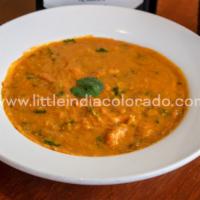Mulligatawny Mughlai Soup · Chicken soup with herbs and mild spices.