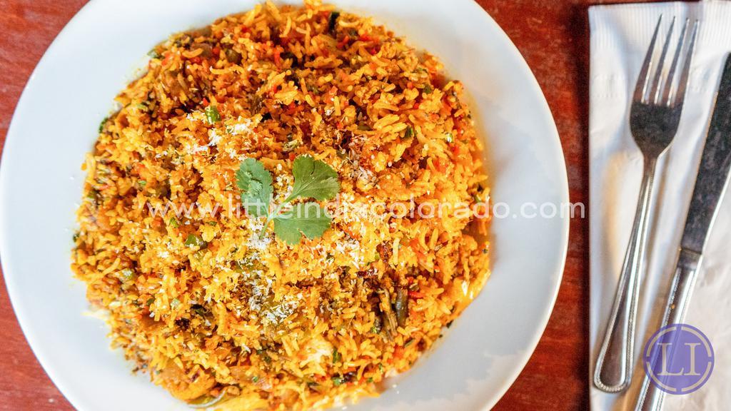 Special Biryani · Shrimp, lamb, chicken and vegetables cooked with Aromatic basmati rice from India, delicately spiced with spices including Coconut, Cashews and raisins. **Onions cannot be removed.