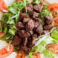 Shaken Beef Salad* · *Contains peanut products.