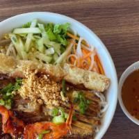 Combination Bowl* · Grilled chicken, shrimp, pork, eggrolls *Contains peanut products.