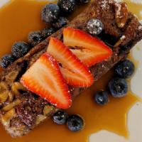 French Toast Bread Pudding · Vegan. Enjoy breakfast anytime. Cinnamon, banana, candied pecans, butter, and pure maple syr...