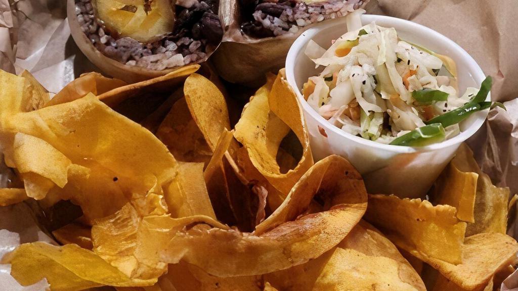 Pollo Wrap · Chicken breast, sautéed onions & mojo aioli /  wrapped with white rice, black beans & sweet plantains served with side of plantain chips & veggie-citrus & jalapeño slaw