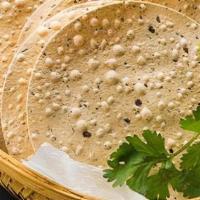 Papad · Lentil chips. Served with mint chutney - 3 pieces