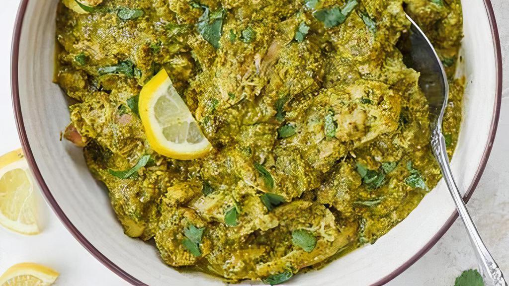 Green Chicken Curry · Spicy South Indian dish with green chilies, coriander leaves, mint, fresh turmeric, yogurt, spices and herbs. Served with plain white rice.