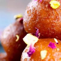 Gulag Jamun · Indian dessert made of dough soaked in aromatic syrup spiced with green cardamom - 3 pieces