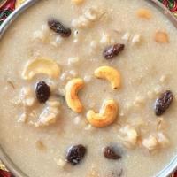 Payasam · South Asian dessert made with toasted vermicelli, milk, sugar, cardamom, cashews, almonds an...