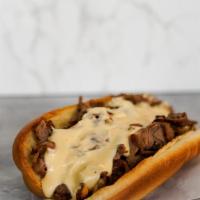 Big Phil'S Classic Philly Cheesesteak · Classic Philly Cheesesteak loaded with steak and your choice of cheese on a toasted 8