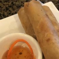 Deep Fried Egg Rolls (3 Rolls) · A mixture of pork, shrimp, chicken, and vegetable rolled in rice paper and fried to a golden...