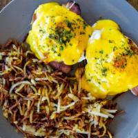 Coal Mine Benedict · English muffin topped with shoulder bacon, poached egg, and hollandaise, served with a side ...