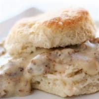 Biscuits & Gravy · Two biscuits with a classic sage breakfast sausage served with two eggs your way.