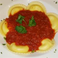 Jumbo Cheese Ravioli · A blend of ricotta, Romano, mozzarella and parmesan cheeses, and spices. Topped with marinar...